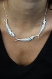 Collar triple esqueleto